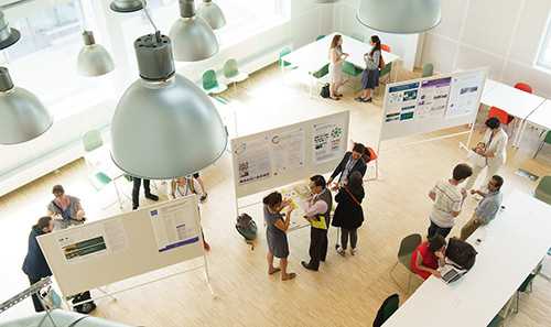 Conference participants at a poster session.