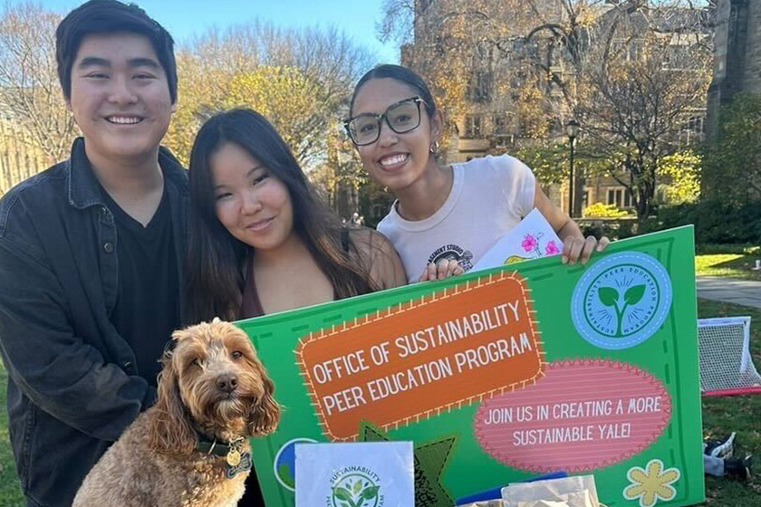 Three Yale students tabling as part of the Sustainability Peer Education Program