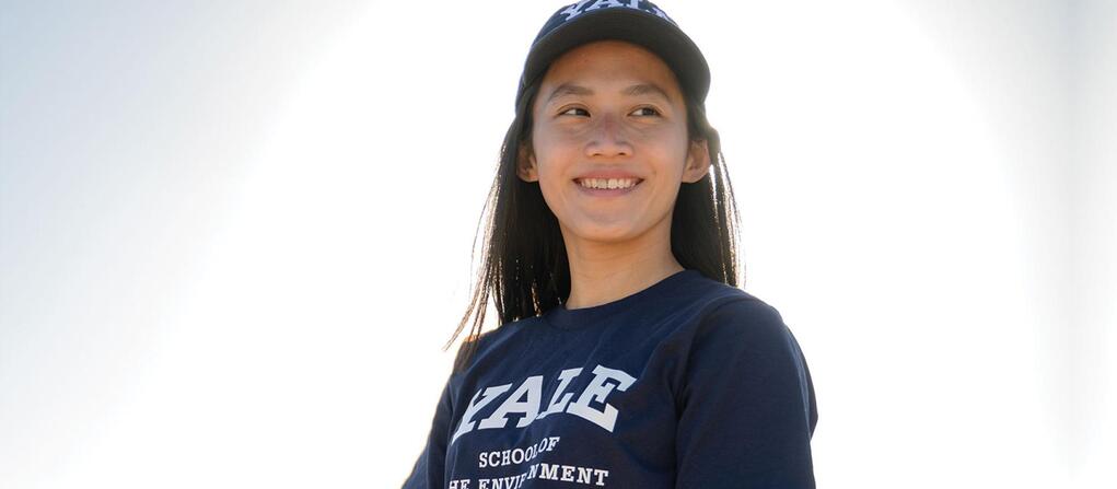 A photo of Yale School of the Environment student Wan Ping Chua wearing Yale apparel
