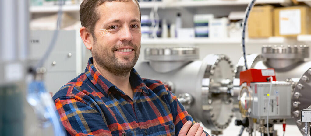 A photo of Yale's Brad Erkkila with the Mini Carbon Dating System