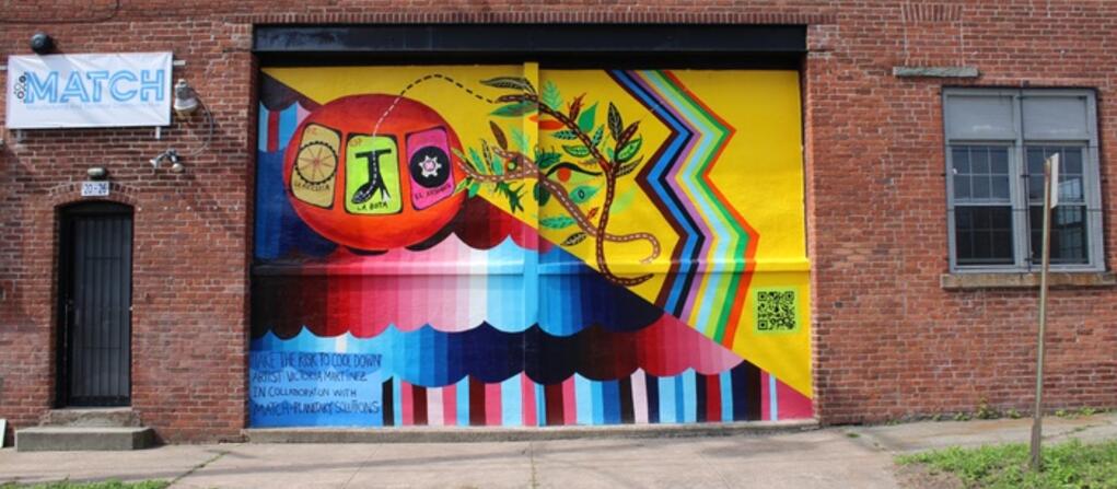 Photo of a climate mural painted by artist Victoria Martinez