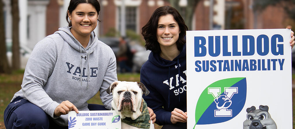 Student athletes with Handsome Dan the Yale mascot promoting sustainability at the Yale-Harvard football game