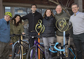 The CMHC Cycles team, with bikes and original bike racks. PC Harold Shapiro