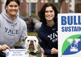 Student athletes with Handsome Dan the Yale mascot promoting sustainability at the Yale-Harvard football game