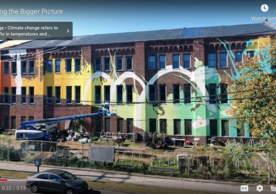 Screen shot from a video about a climate mural painted on the New Haven Armory