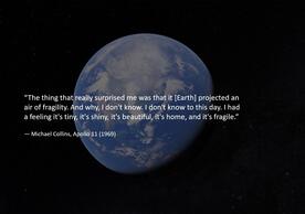 Photograph of Planet Earth with Michael Collins quotation